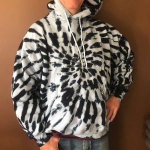 Tie-dyed hooded sweatshirt in black-and-white.